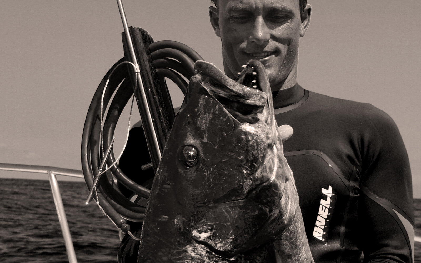 Black and White Photo of Pargo and Spearfisherman