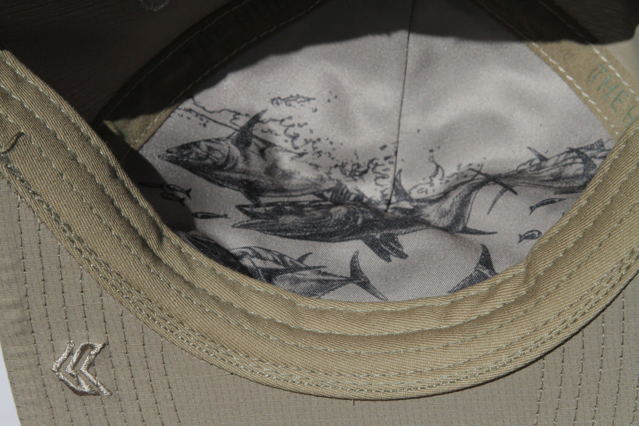 Tuna detail in black on inside of hat, also embroidered K logo