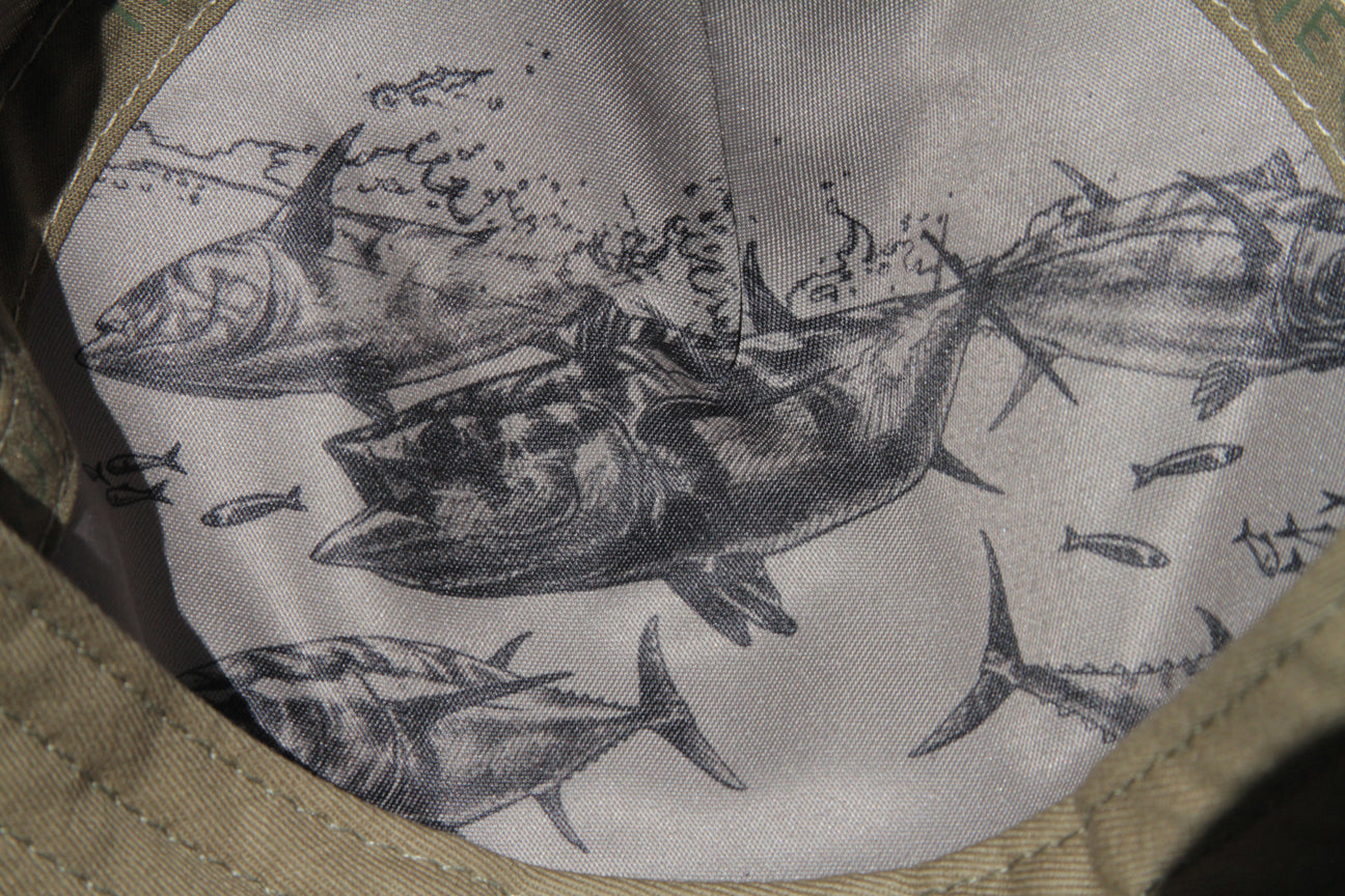 Tuna detail in black on inside of hat 